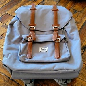 The herschel laptop backpack, color Grey new with tags.